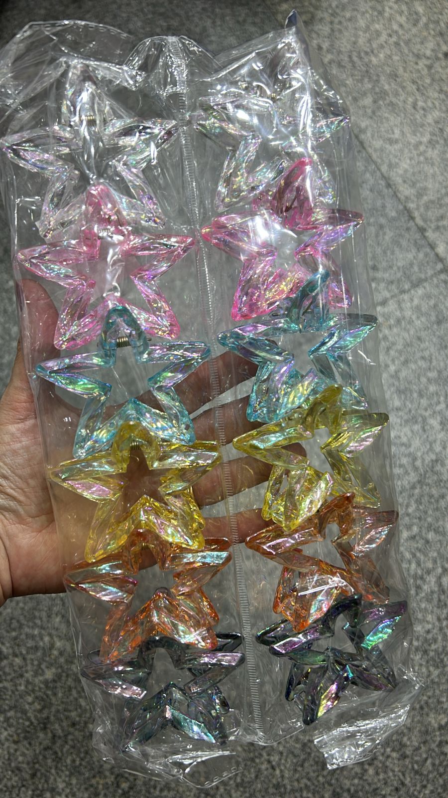 Pregadeira m poliéster transparente estrela (12 peças cores variadas)
