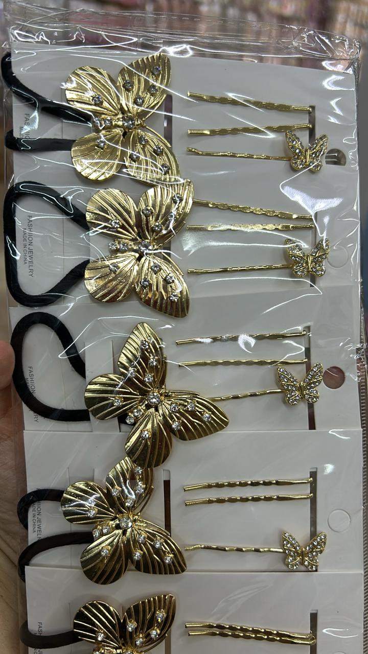 Xuxinha Borboleta  e 3 grampos com borboleta e trançado (12 cartelas com 4 peças cada)