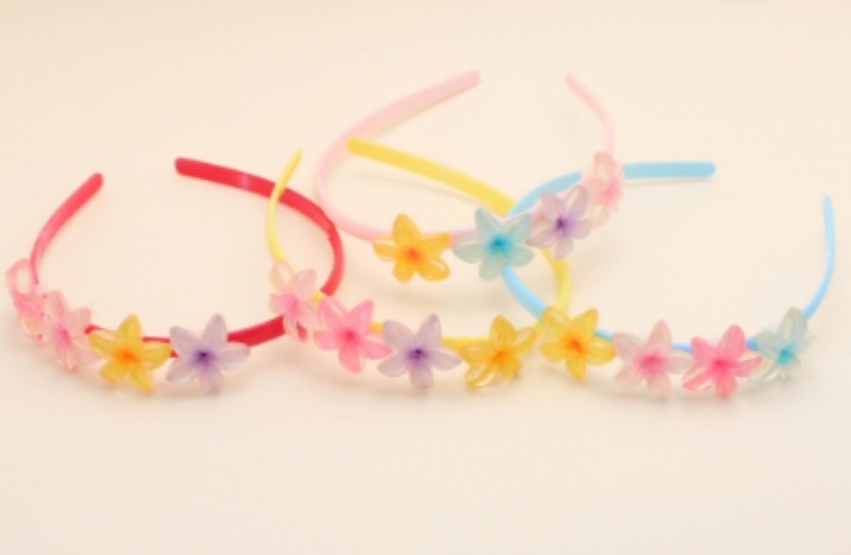 Tiara infantil poliéster com dentinho flor havaiana (12 peças cores variadas)