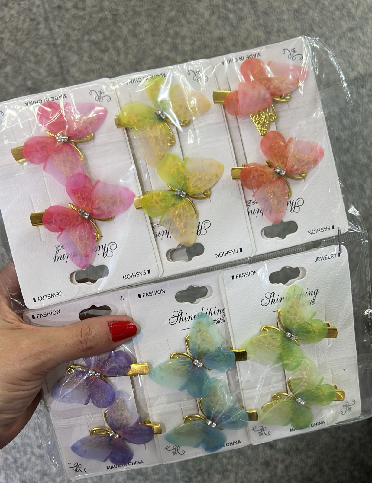 Hair clip borboleta voal colorido (12 cartelas com 2 peças cada)