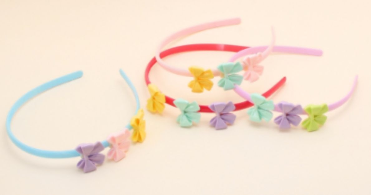 Tiara infantil poliéster com dentinho lacinho (12 peças cores variadas)