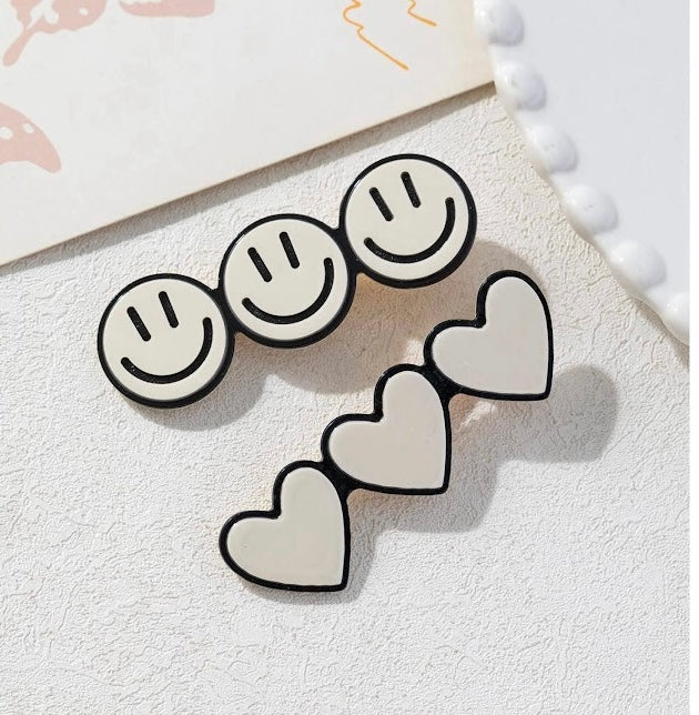 Hair Clip Infantil base metal com aplique Coração e Smile Cores Invernais (12 cartelas com 2 peças cada)