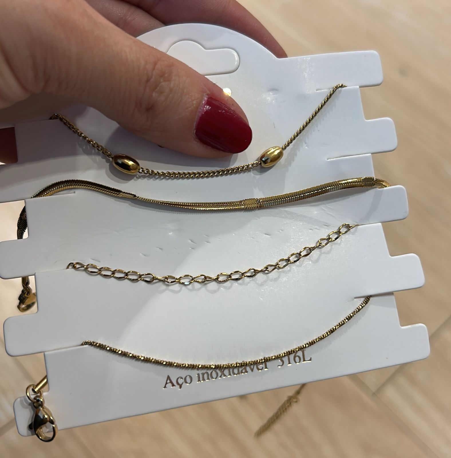 Conjunto com pulseiras Dourado (12 cartelas com 4 peças cada)