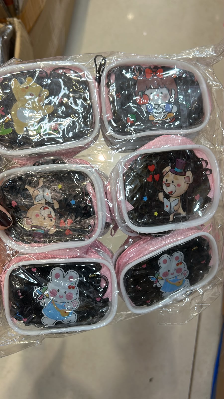 Bolsinha de zíper com liguinha de silicone preta (12 peças)