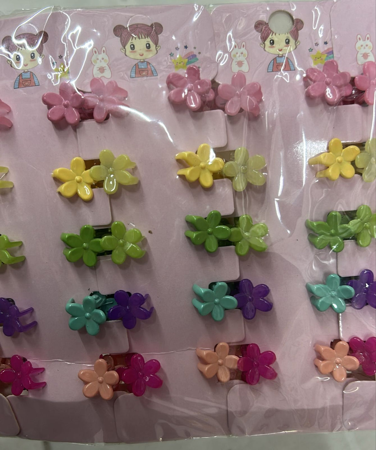 Cartela infantil com mini pregadeiras poliéster flor (12 cartelas com 10 peças cada)