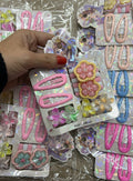 Kit infantil com tic tac frufru, xuxinha flor e mini pregadeira (12 cartelas com 12 peças cada)