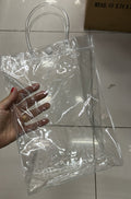 Sacola pvc transparente com fechamento botão 20x28x10 (12 peças)