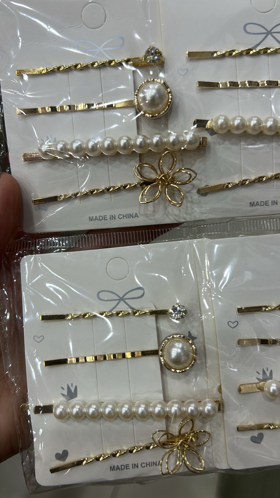 Grampos pérola, e flor (12 cartelas com 4 peças cada)