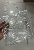Sacola pvc transparente com fechamento botão 20x20x8 (12 peças)