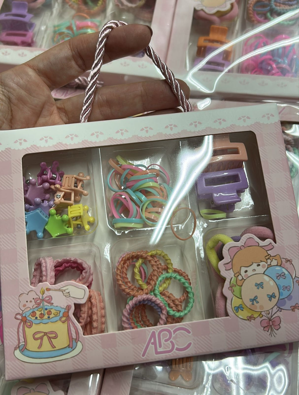 Caixinha com visor e alça com acessórios infantis - Xuxinha Frisos (12 caixas)