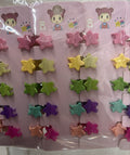 Cartela infantil com mini pregadeiras poliéster estrelinha (12 cartelas com 10 peças cada)