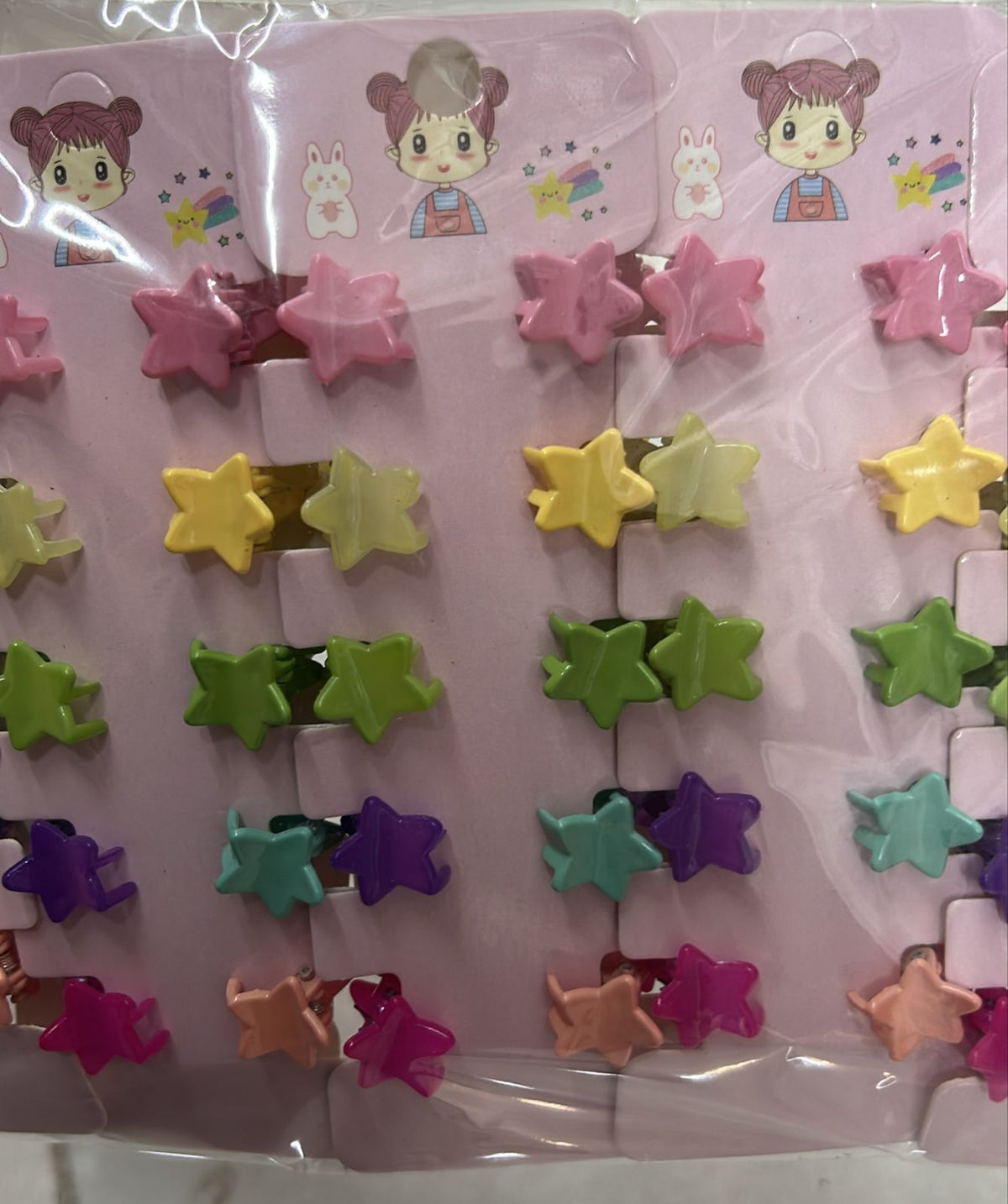 Cartela infantil com mini pregadeiras poliéster estrelinha (12 cartelas com 10 peças cada)