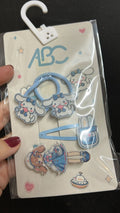 Kit hair clip e xuxinhas Sanrio (12 cartelas com 4 peças cada)