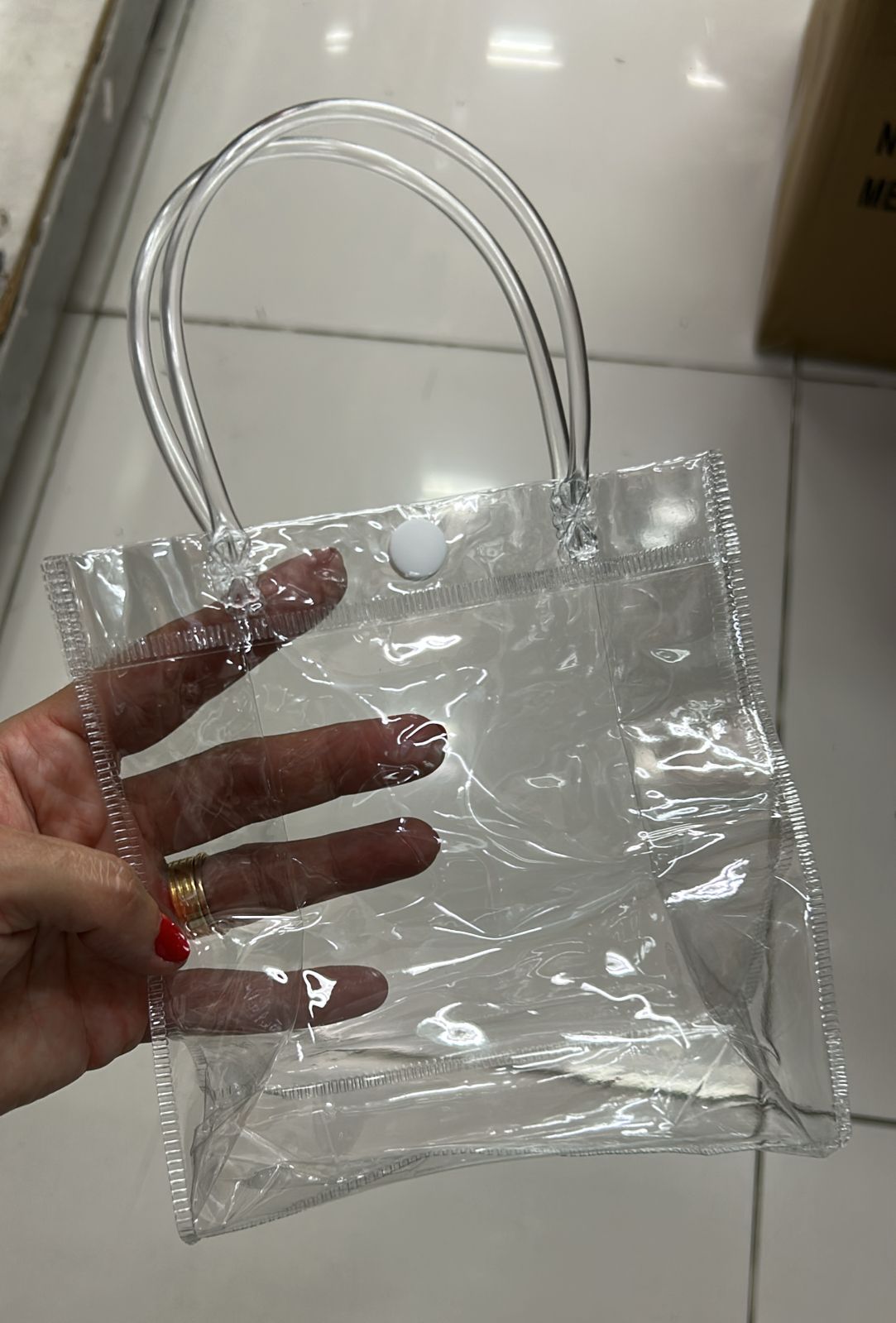 Sacola pvc transparente com fechamento botão 15x16x7 (12 peças)