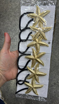 Xuxinha aplique metal com estrela do mar dourada (12 peças)