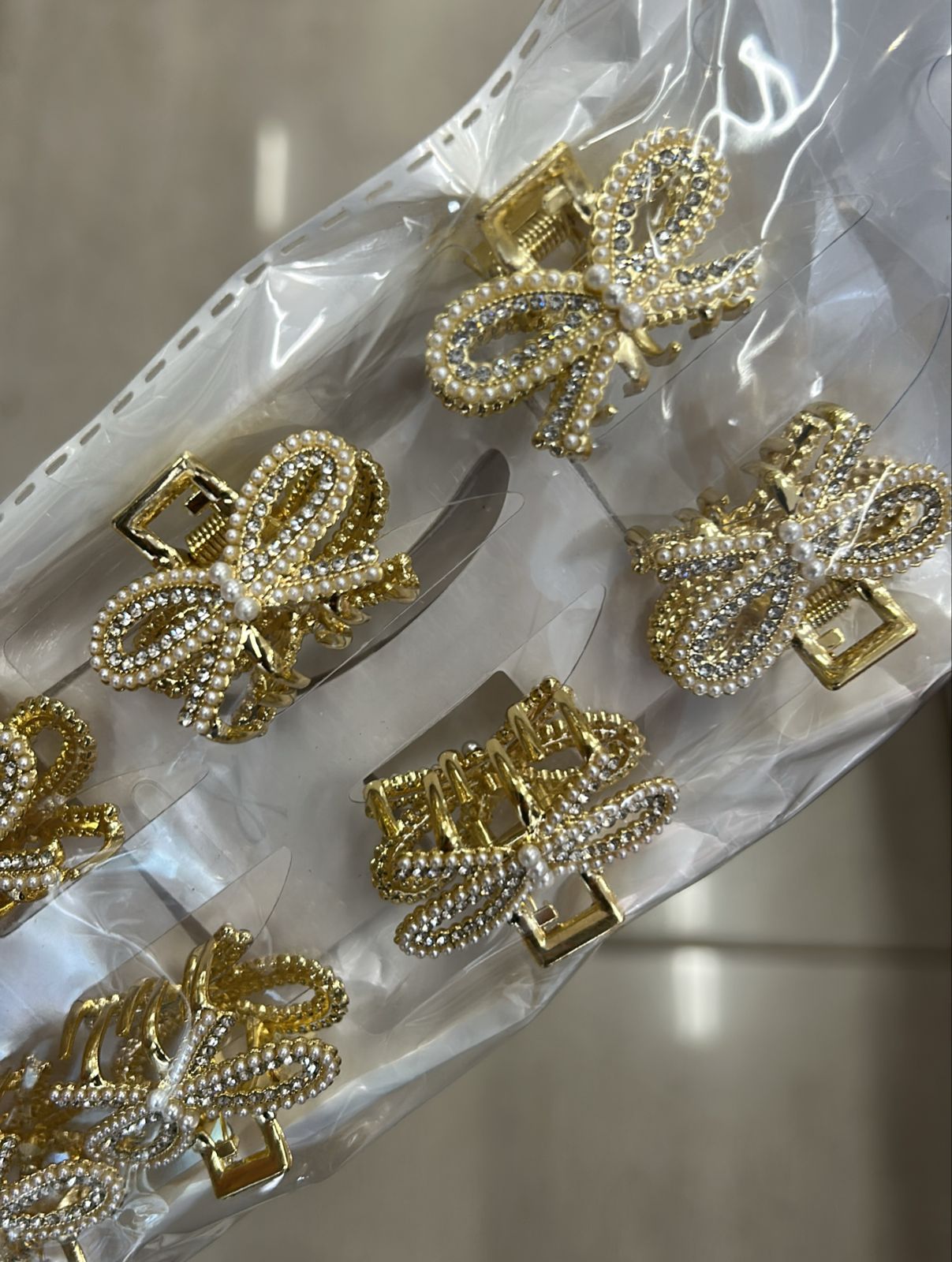 Pregadeira p metal cravejada laço com ponta (12 peças)