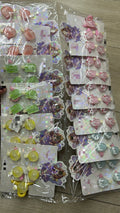 Cartela infantil com xuxinha, hair clip e pregadeira picolés frutas (12 cartelas com 5 peças cada)