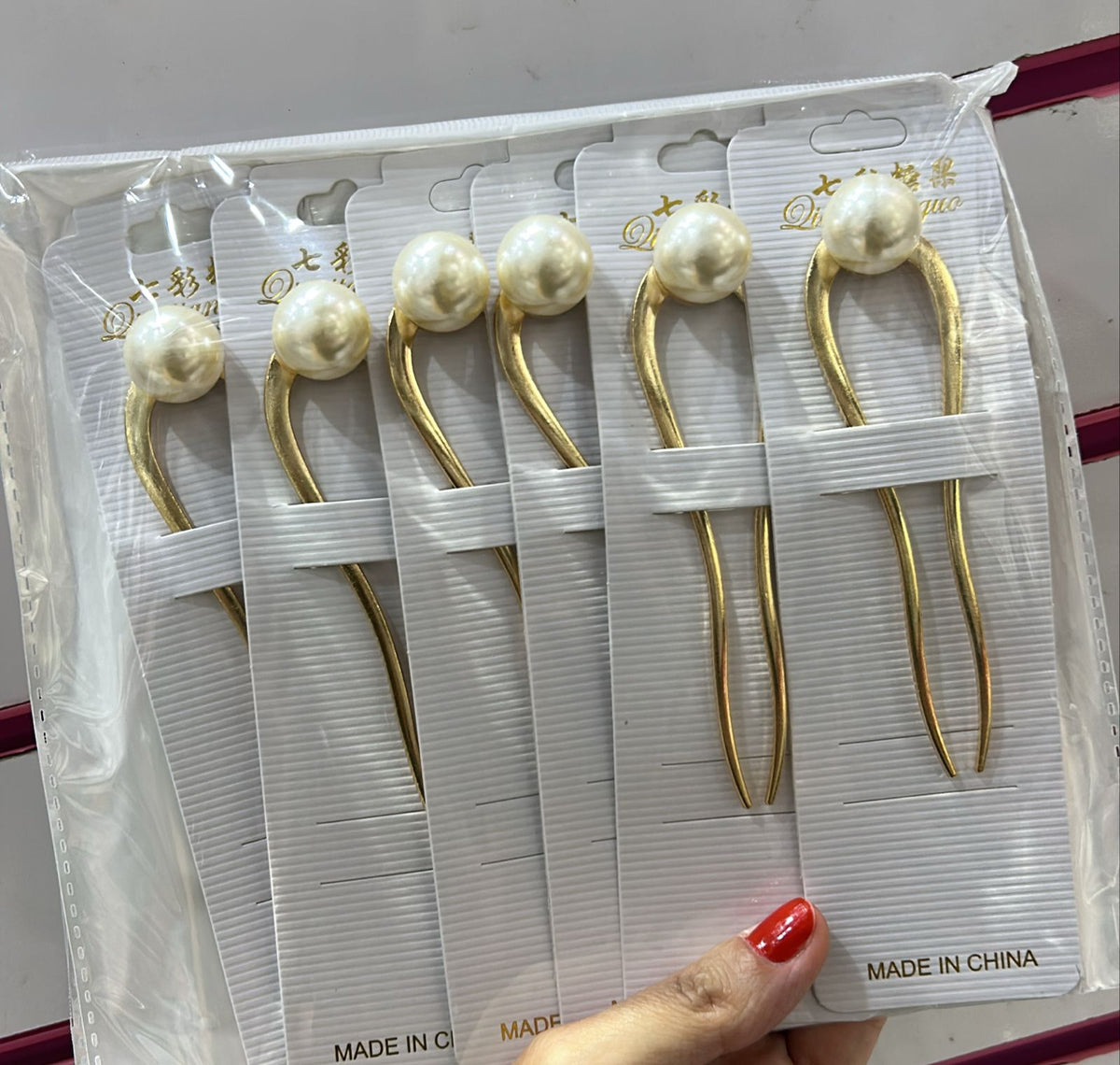 Pente coque com solitário pérola (12 peças douradas)