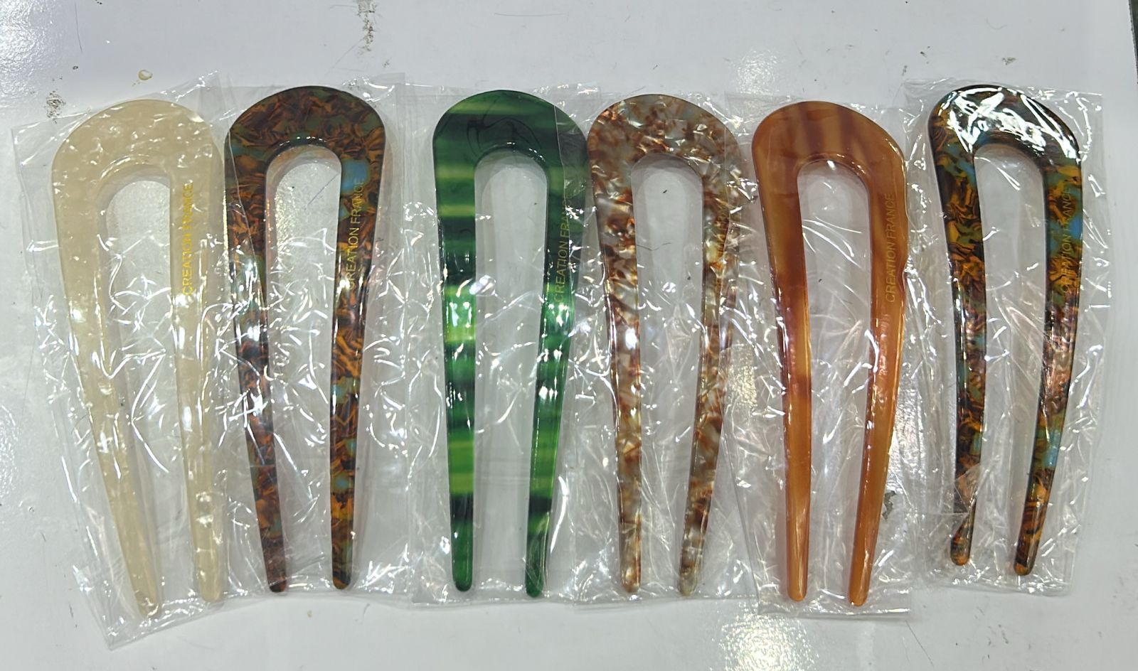 Pente coque acetato mesclado (12 peças 6 brancas e nas demais cores variado)