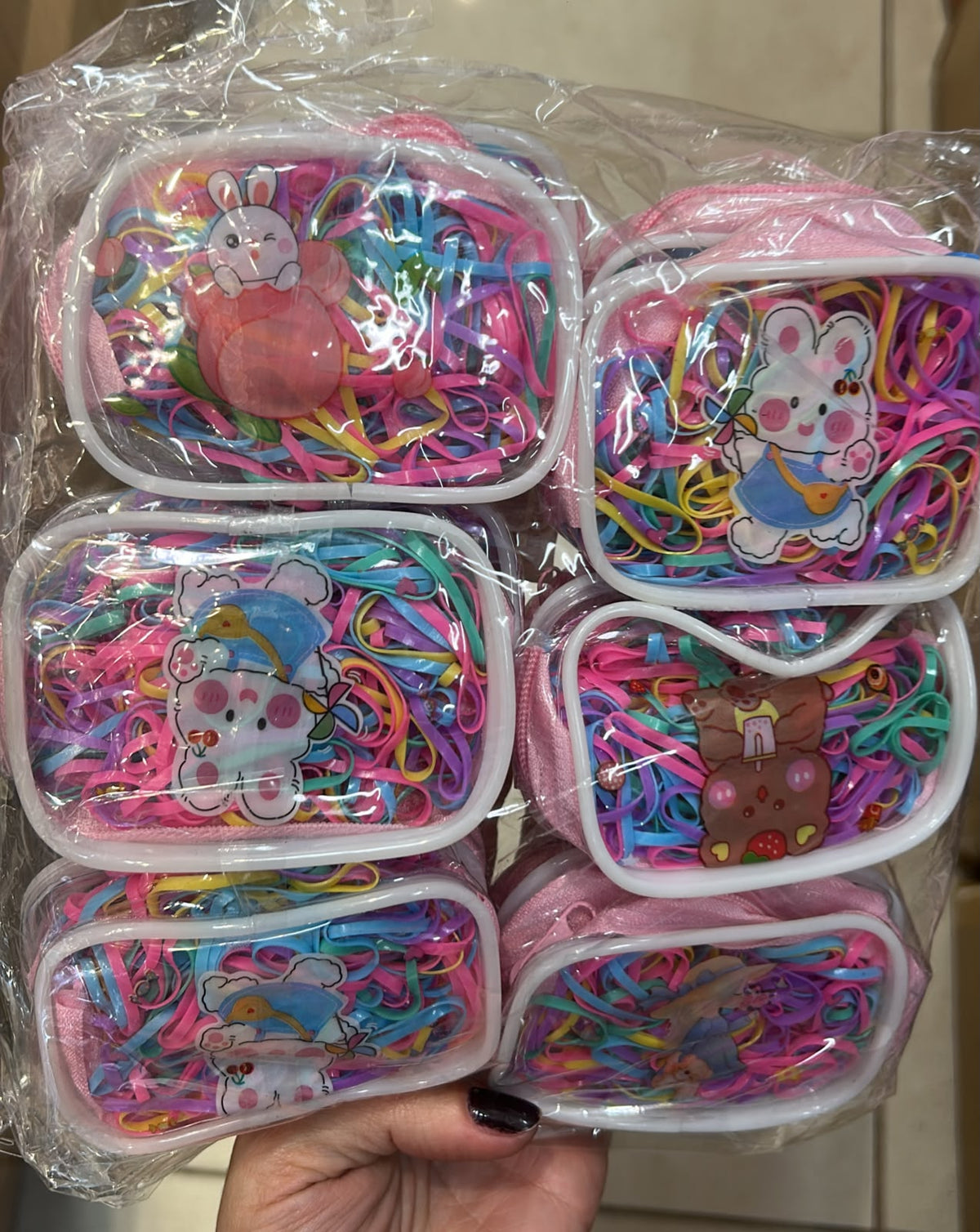 Bolsinha de zíper com liguinha de silicone colorida (12 peças)
