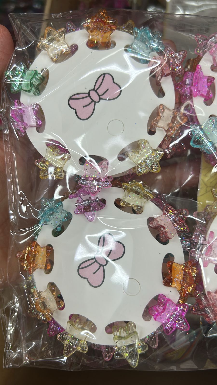 Cartela mini pregadeira poliéster infantil estrela glitter (12 cartelas com 10 peças cada)