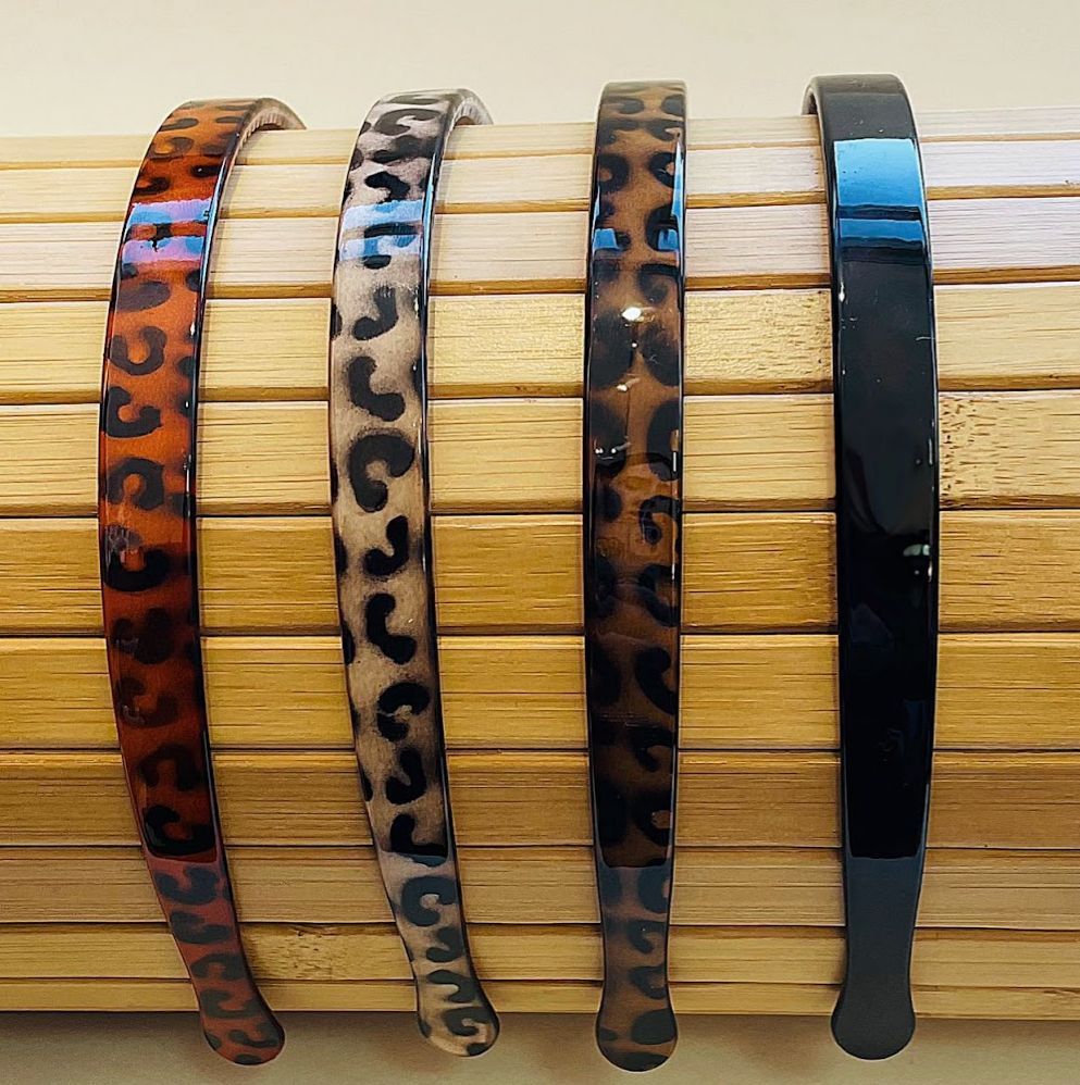 Tiara Poliéster com dentinhos animal print (12 peças 3 de cada cor)