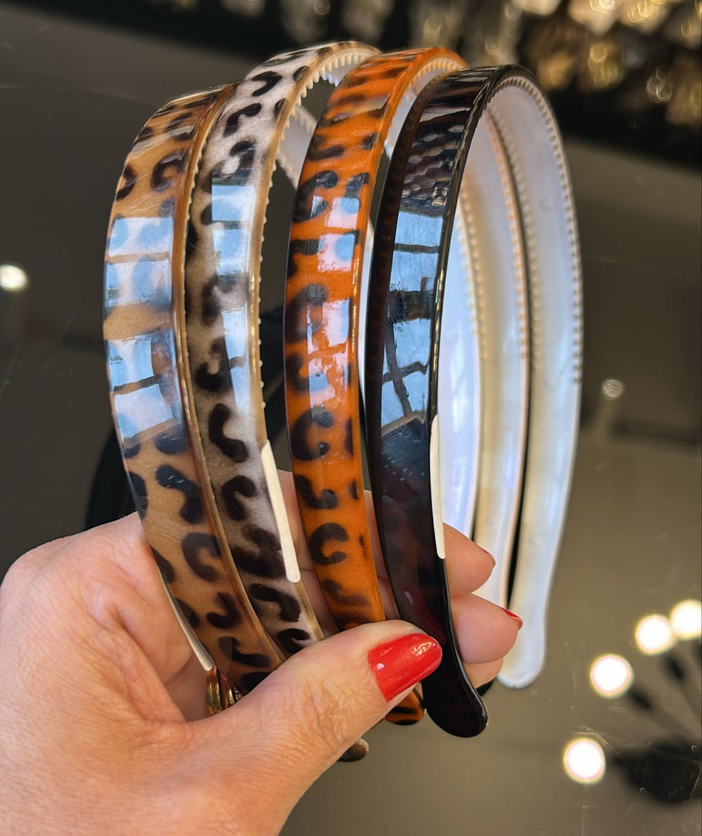 Tiara Poliéster com dentinhos animal print (12 peças 3 de cada cor)