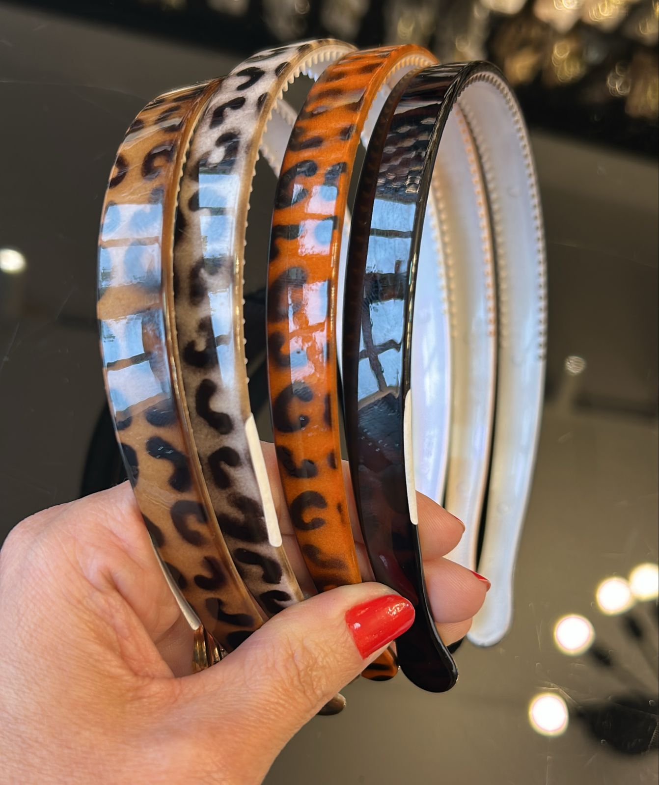 Tiara Poliéster com dentinhos animal print (12 peças 3 de cada cor)