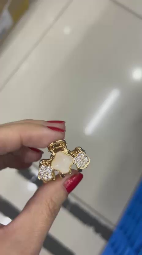 Pregadeira PP metal trevo com olho de gato e cravejado (12 peças)